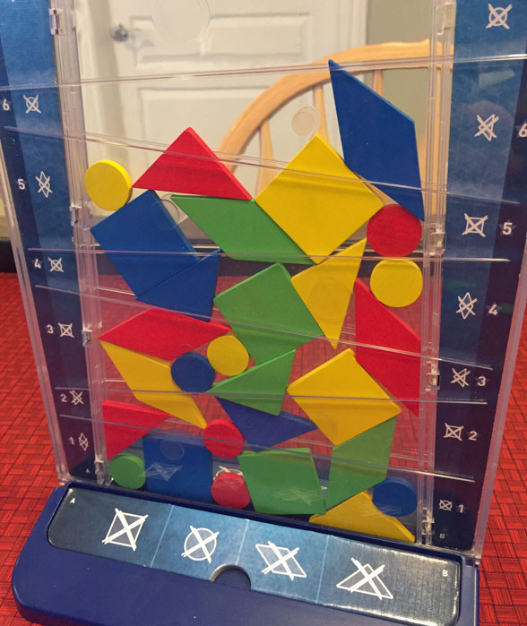 Falling shapes are fun in Drop It - The Board Game Family